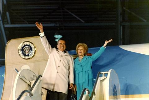 President and Mrs. Nixon wave from Air Force One